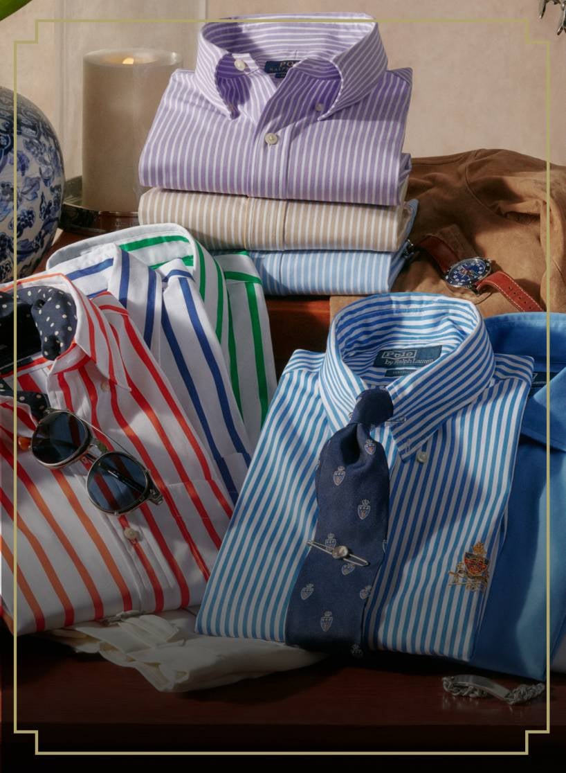 Folded striped button-down shirts.