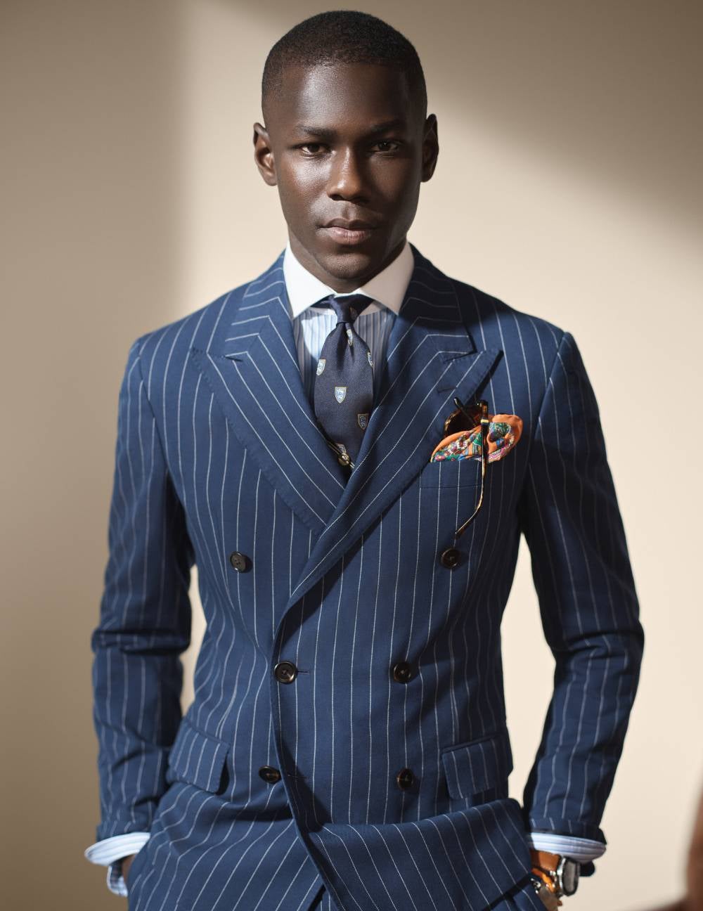 Model wearing stripe jacket and pants