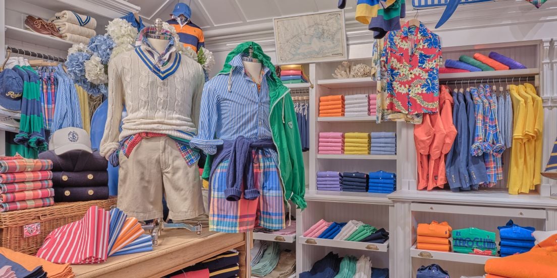 Colorful Ralph Lauren apparel inside store.