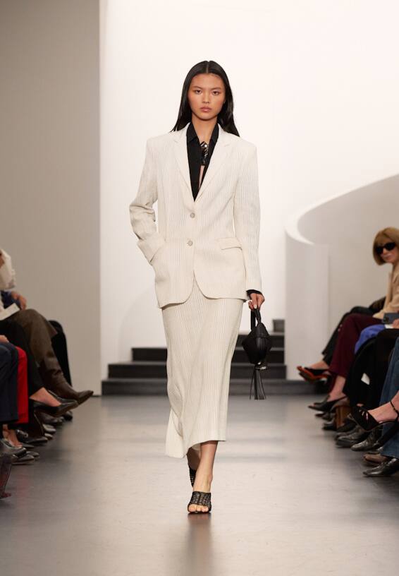 A look from Ralph Lauren’s Fall 2025 runway show shown on model.