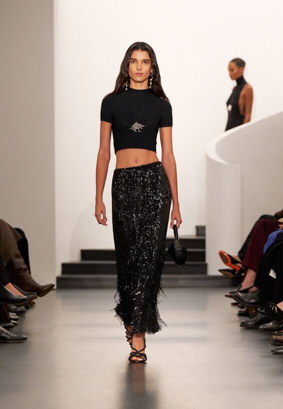 A look from Ralph Lauren’s Fall 2025 runway show shown on model.