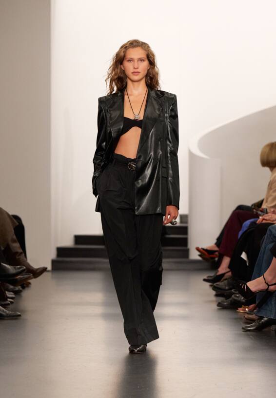 A look from Ralph Lauren’s Fall 2025 runway show shown on model.